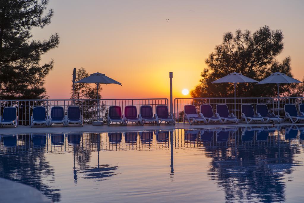Garcia Resort & Spa Oludeniz Exterior photo Sunset at the beach