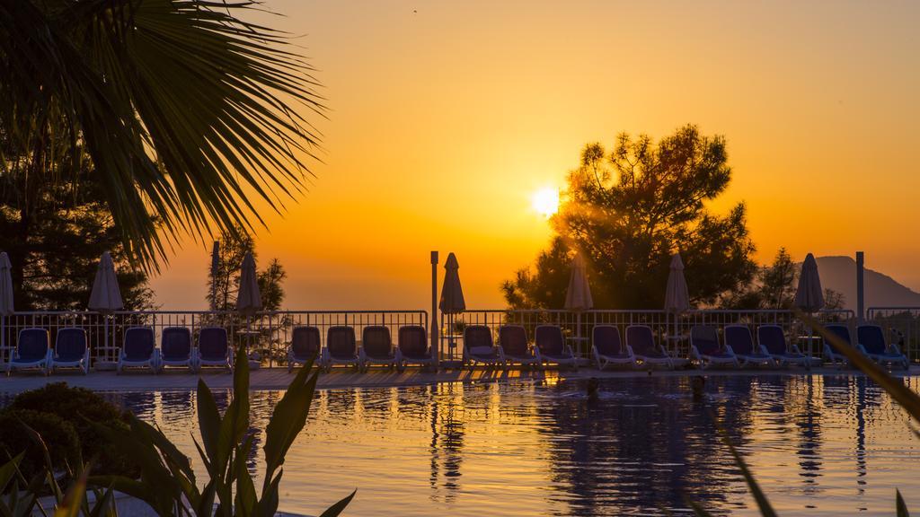 Garcia Resort & Spa Oludeniz Exterior photo Sunset at the beach