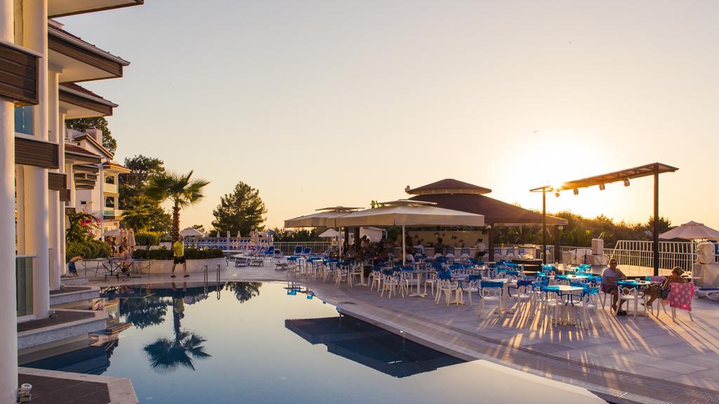 Garcia Resort & Spa Oludeniz Exterior photo Sunset at the pool