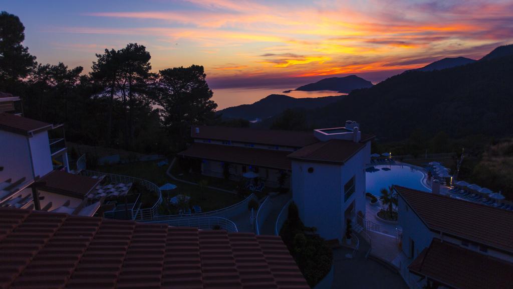 Garcia Resort & Spa Oludeniz Exterior photo Sunset over the bay